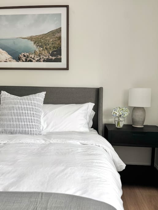 Clean, calming linens and soft lighting create a peaceful space for restful sleep. Clean, calming linens and soft lighting create a peaceful space for restful sleep. - Peaceful & Convenient 2BR Near Ballantyne - Charlotte
