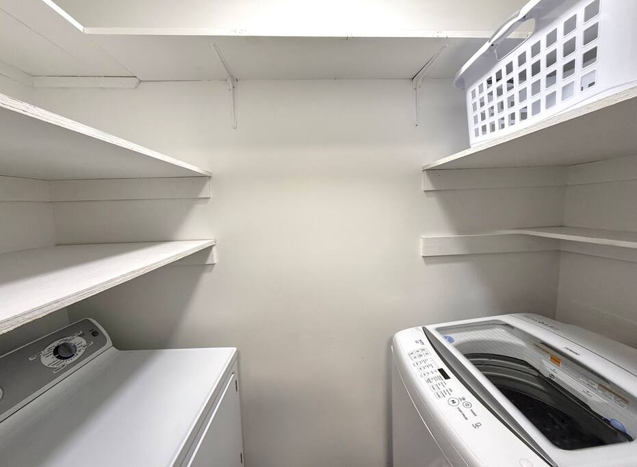 In-unit laundry with shelving and essentials—perfect for extended stays or weekly refreshes In-unit laundry with shelving and essentials—perfect for extended stays or weekly refreshes - Peaceful & Convenient 2BR Near Ballantyne - Charlotte