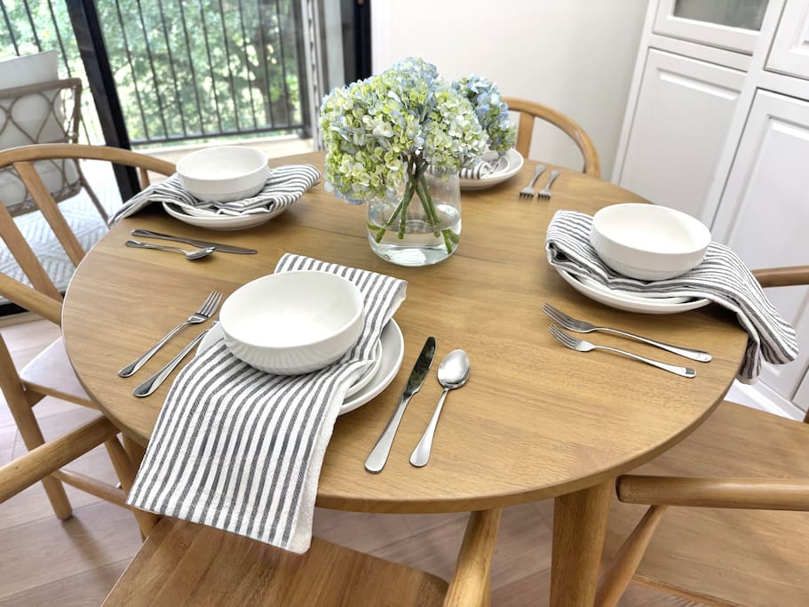 Enjoy meals or morning coffee in a calm, well-lit space that feels like home. Enjoy meals or morning coffee in a calm, well-lit space that feels like home. - Peaceful & Convenient 2BR Near Ballantyne - Charlotte