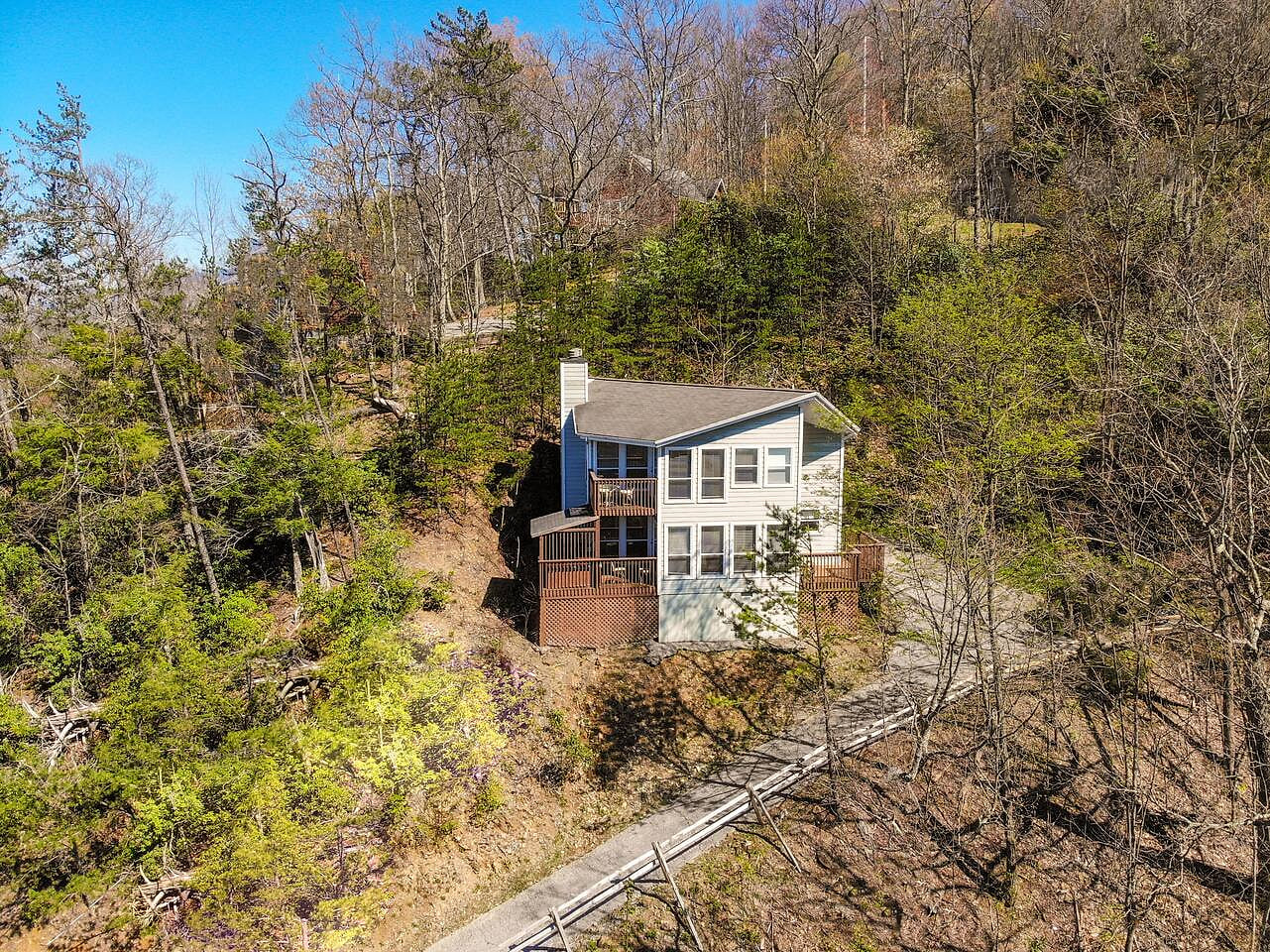 You're on top of Ober mountain. Your private mountain. Arial photo of your new Chalet Vacation Escape. Drive up our driveway to the top with flat parking for 2 cars. Any car can make our driveway just fine. Solitude. Peace. Totally worth the climb.