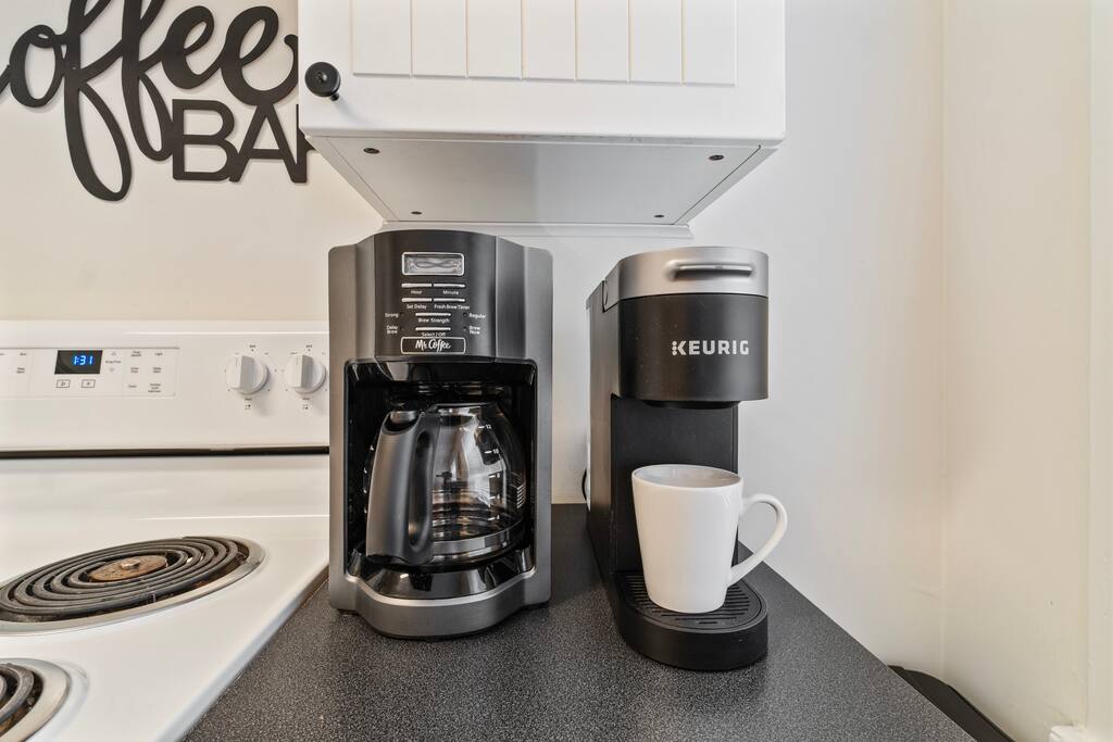 Start your day right at the downstairs coffee bar, featuring both a drip machine and Keurig—perfect for fueling up before exploring Chattanooga Start your day right at the downstairs coffee bar, featuring both a drip machine and Keurig—perfect for fueling up before exploring Chattanooga - In Southside | Roomy 6 Bedroom | Walk to Choo Choo - Chattanooga