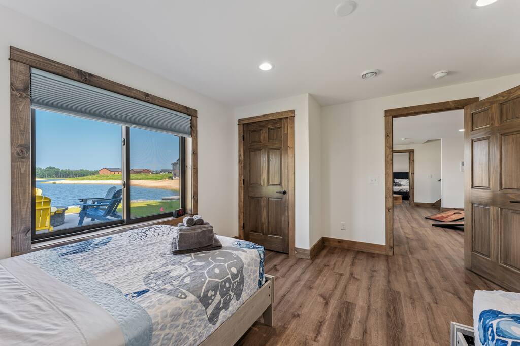 Bedroom 4 features 2 full beds, TV with Roku streaming services and a closet with hangers. Bedroom 4 features 2 full beds, TV with Roku streaming services and a closet with hangers. - New Listing Lakeside Beach Sleeps 15+ Pet friendly - New Lisbon