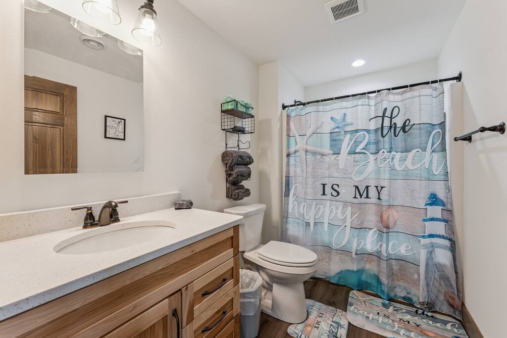 Full Bathroom 3 downstairs features a stand up shower, toilet and sink. Shampoo, conditioner and bodywash and hand soap are provided. Full Bathroom 3 downstairs features a stand up shower, toilet and sink. Shampoo, conditioner and bodywash and hand soap are provided. - New Listing Lakeside Beach Sleeps 15+ Pet friendly - New Lisbon