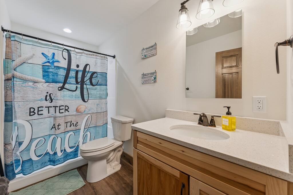 Full Bathroom 2 Upstairs features a stand up shower, toilet and sink. Shampoo, conditioner and bodywash and hand soap are provided. Full Bathroom 2 Upstairs features a stand up shower, toilet and sink. Shampoo, conditioner and bodywash and hand soap are provided. - New Listing Lakeside Beach Sleeps 15+ Pet friendly - New Lisbon