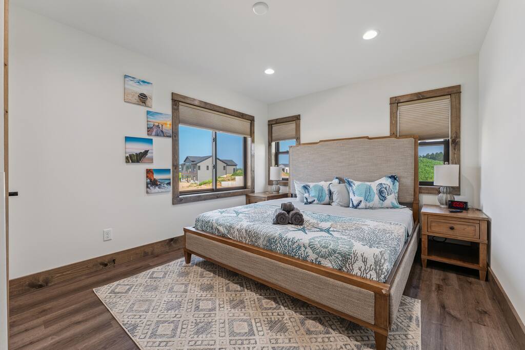Bedroom 2 features a king bed, end tables, alarm clock with USB port and closet with hangers. Bedroom 2 features a king bed, end tables, alarm clock with USB port and closet with hangers. - New Listing Lakeside Beach Sleeps 15+ Pet friendly - New Lisbon