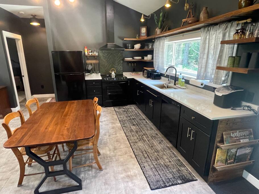 In kitchen dining table with four chairs. In kitchen dining table with four chairs. - New Listing 2BR/2BA on Trout Lake HotTub & Firepit - Wisconsin Dells