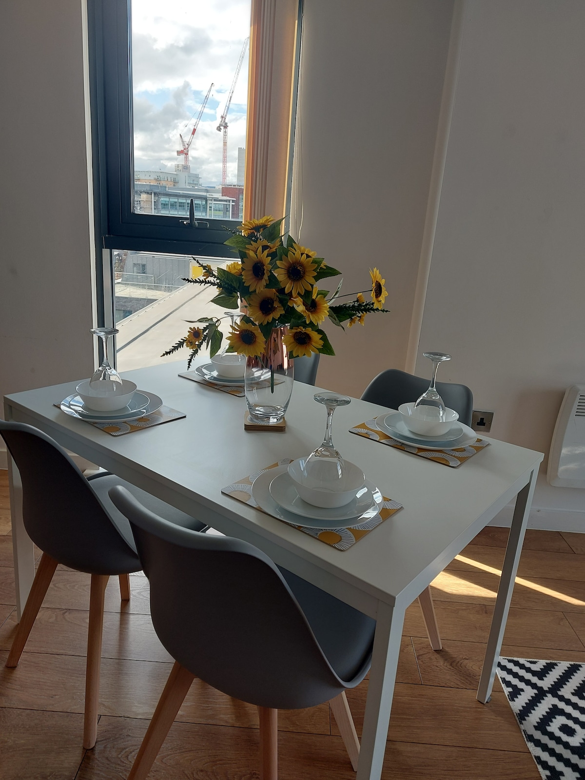 Dining table with chairs -open plan dining + living area.