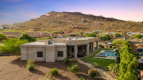 Mountain View Backyard with pool and hot tub with cornhole, axe throwing, and tv near patio-set
