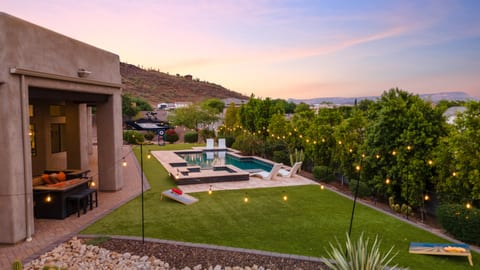 Mountain View Backyard with pool and hot tub with cornhole, axe throwing, and tv near patio-set