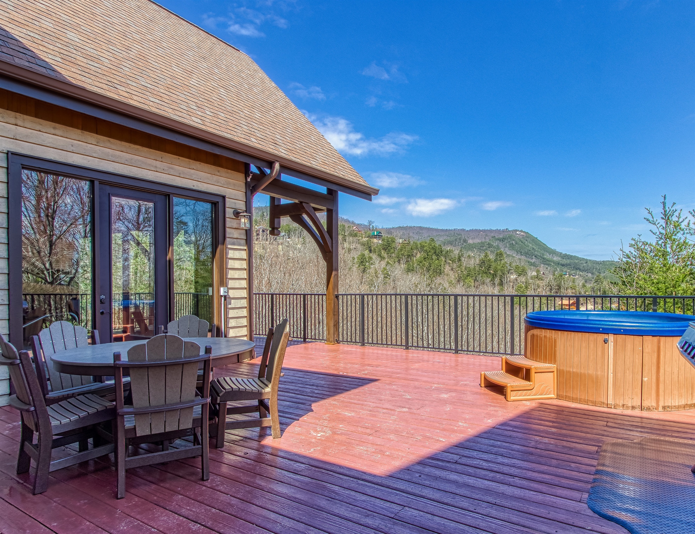 Spacious deck with stunning Smoky Mountain views and plenty of seating to soak it all in