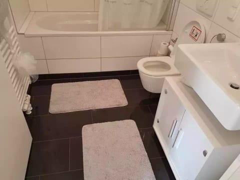 Bathroom 1 with bathtub