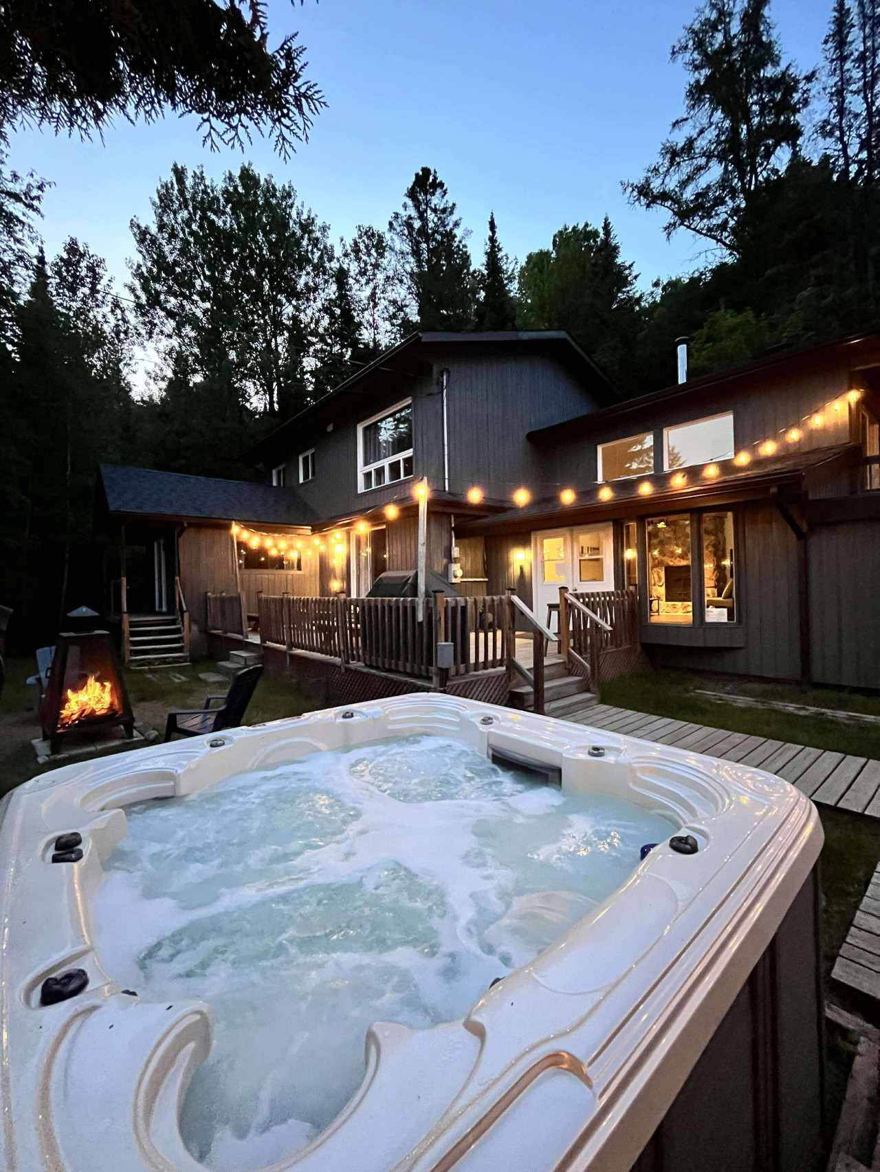 lake-house-5br-with-sandy-beach-spa-and-fire-pit/