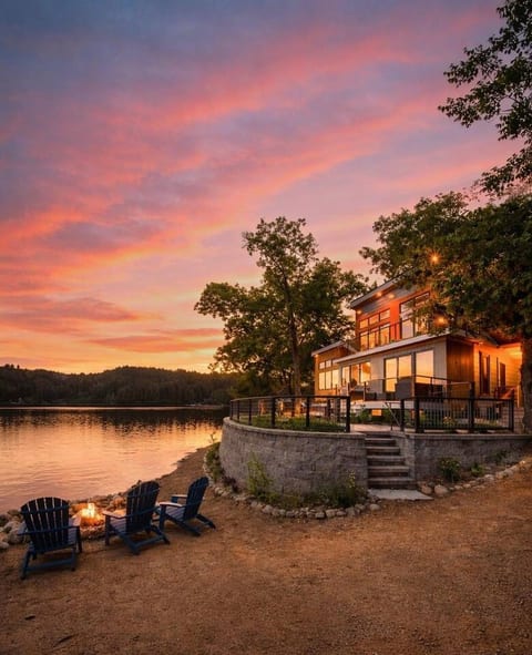 Our home sits just steps from the shoreline, allowing your group to move effortlessly between the beach, patios, hot tub, indoor comforts, & waterfront adventures.