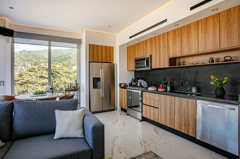 Create unforgettable meals in this kitchen, featuring a 6-burner gas stove and all the cookware you need for a perfect culinary experience in Puerto Vallarta.
