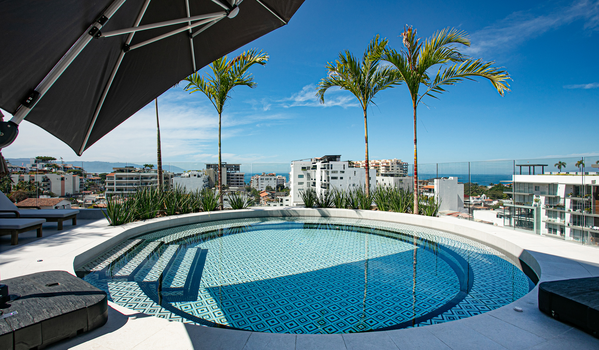 Relax in Puerto Vallarta's largest rooftop hot tub, offering stunning panoramic views and the perfect setting for unforgettable sunsets.