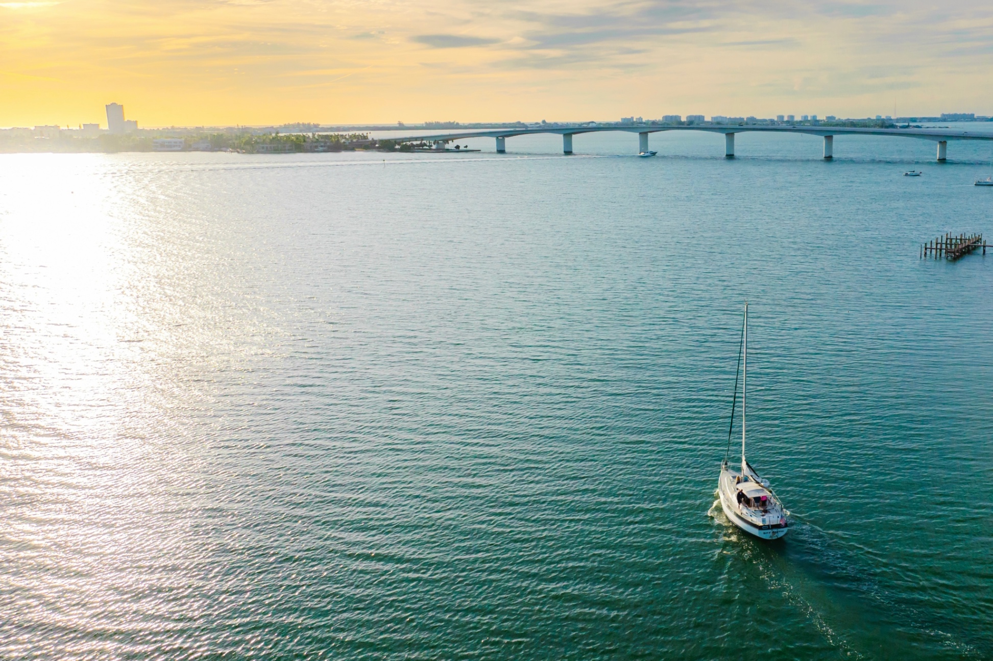 Sarasota Bay, your backyard playground — sail at sunset, kayak the shallows, or watch the skyline shimmer from the shore