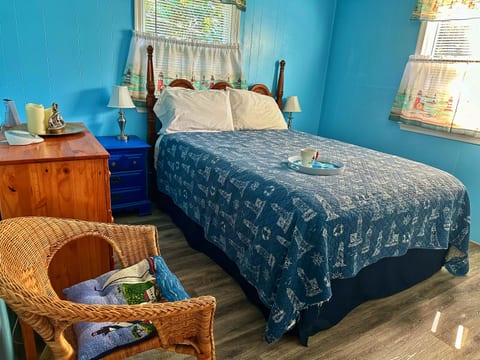 Each bedroom has a chair, 3 drawer dresser, and a sound machine. The alarm clock also has USB charging ports for phones/tablets.