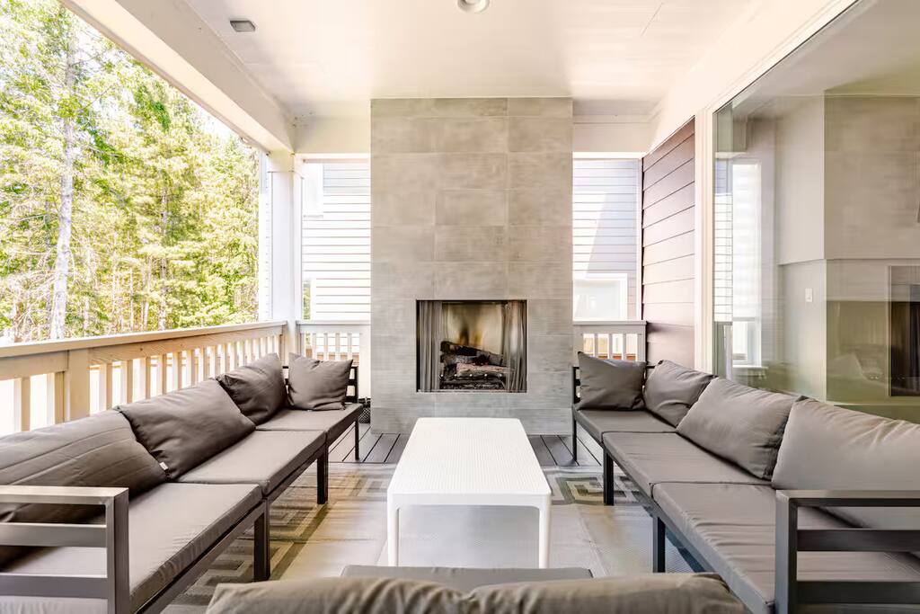 Spacious deck with abundant seating, perfect for relaxing or entertaining. Gather around the cozy outdoor fireplace and enjoy evenings under the stars. Ideal for groups, with plenty of room to unwind, dine, or simply take in the fresh air and views.