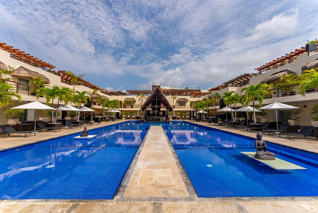 This is the grand centerpiece of your Playa del Carmen escape. The spectacular pool stretches out before you, offering an expansive and beautiful setting for your vacation days. From a refreshing morning swim to lounging in the afternoon sun. Oceanfront Retreat Aldea Thai at Mamitas Beach/5th