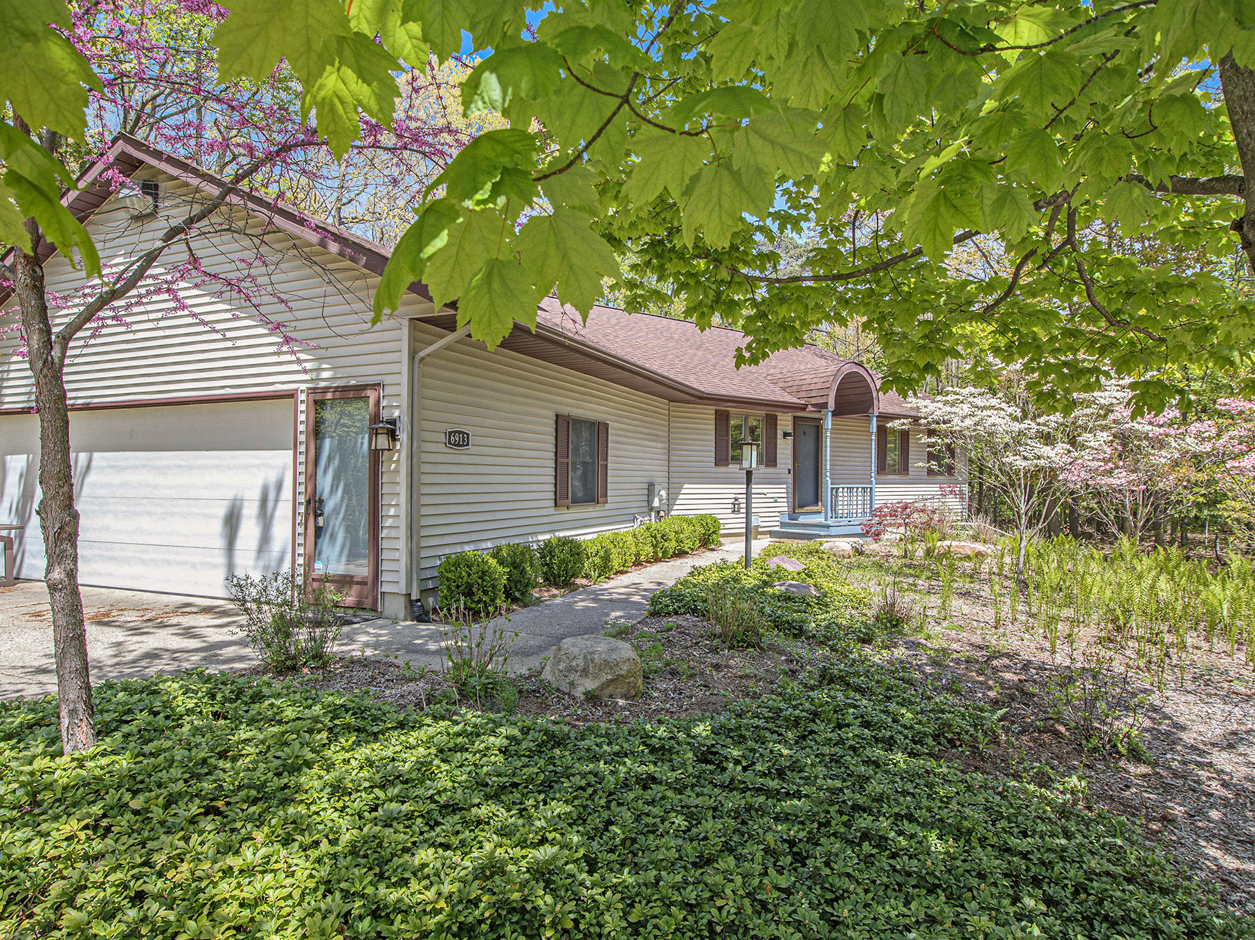 Front walkway with leafy outlook.  