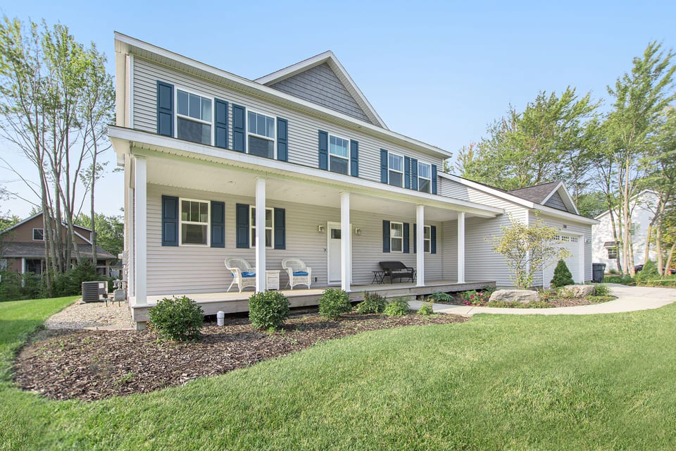 Front of house with wide front porch.