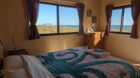 Sunrise room. Queen size bed- access to the terrace on the upper floor