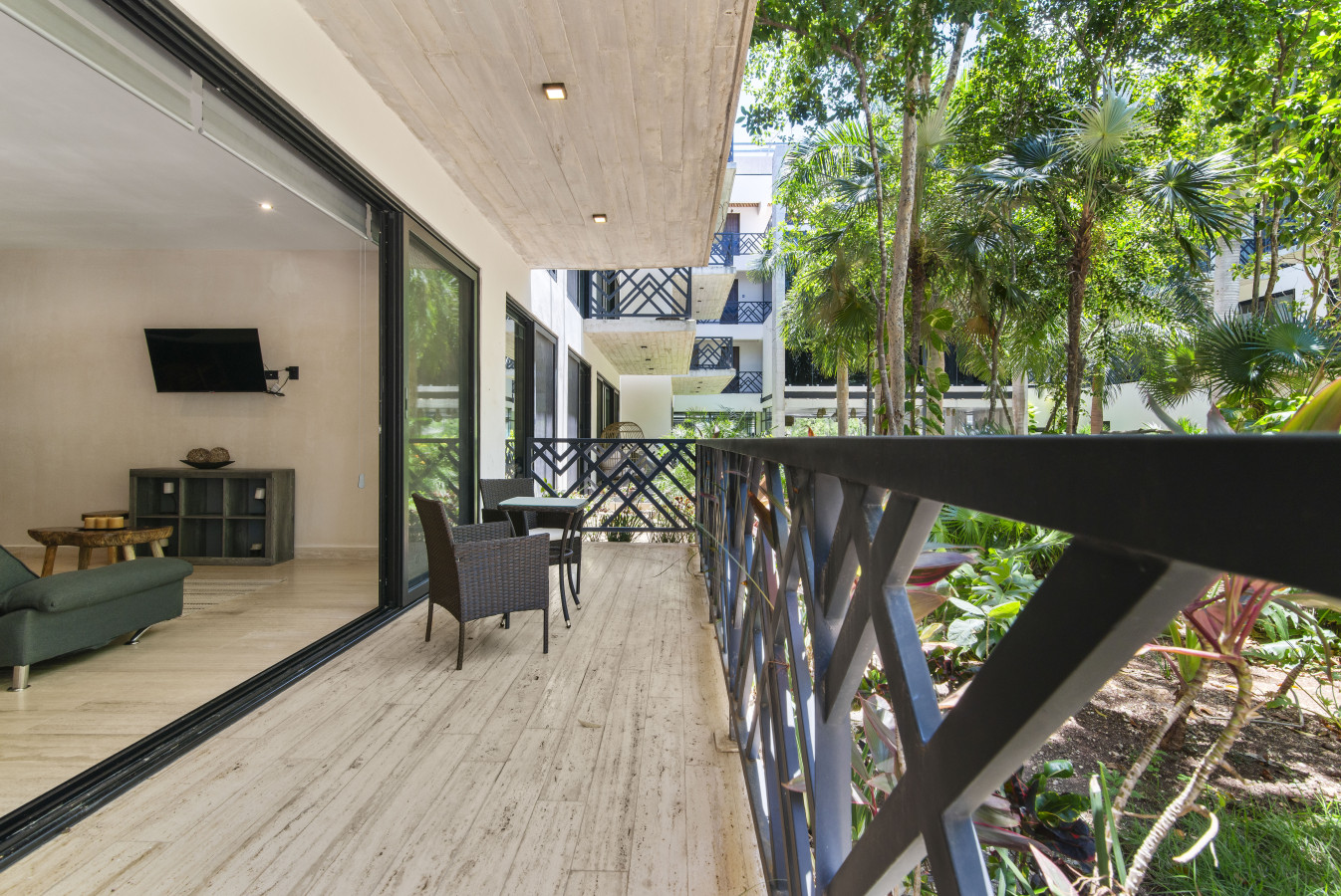 Start your day with a fresh coffee or wind down with a glass of wine on your spacious private terrace. Surrounded by tropical greenery, it’s the perfect place to unwind, read, or soak in the peaceful  views.
