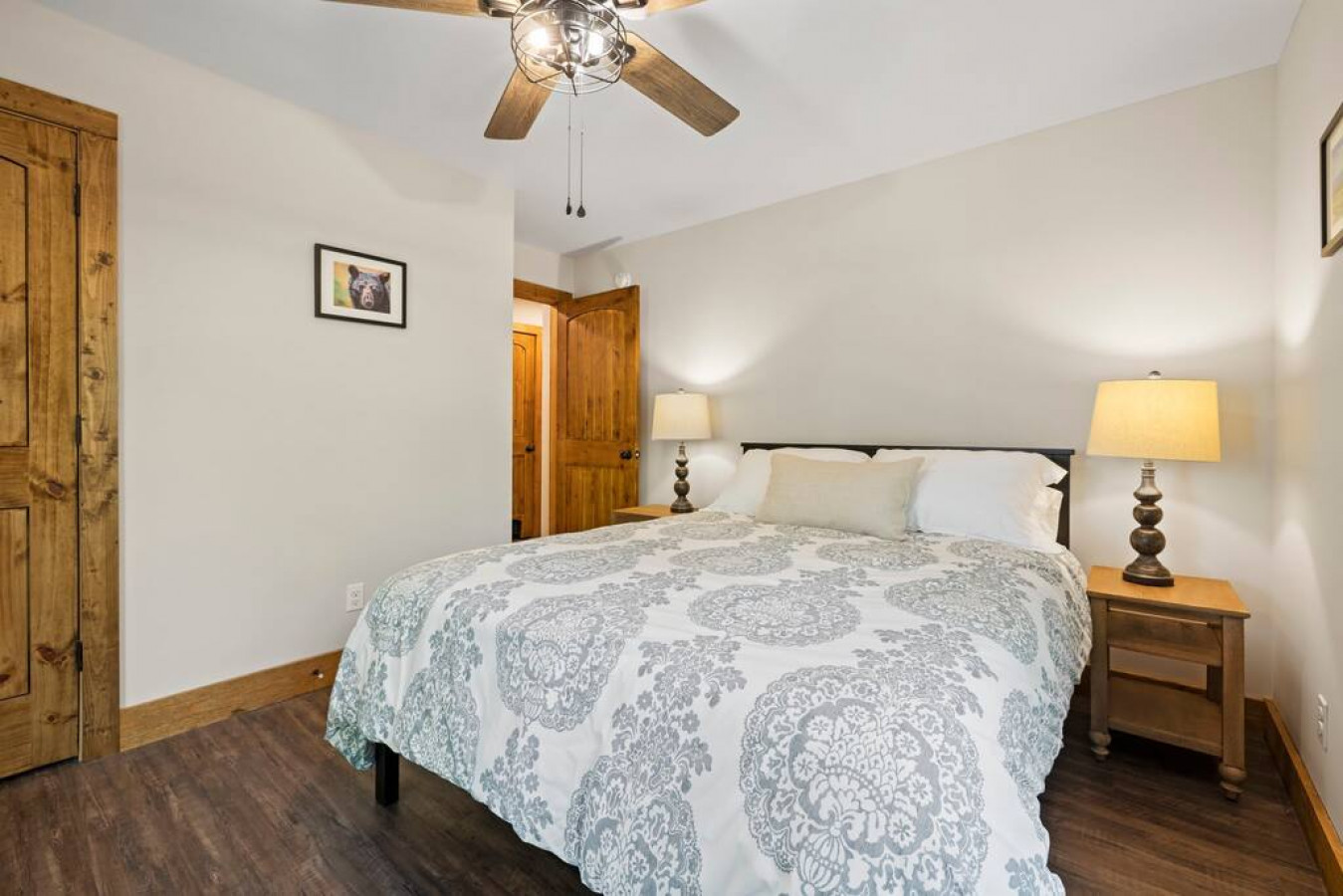 Main level bedroom with queen bed
