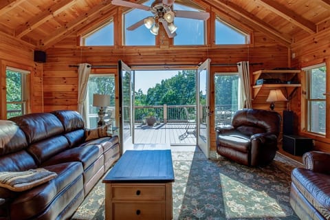 Main level great room opens to spacious wrap around deck