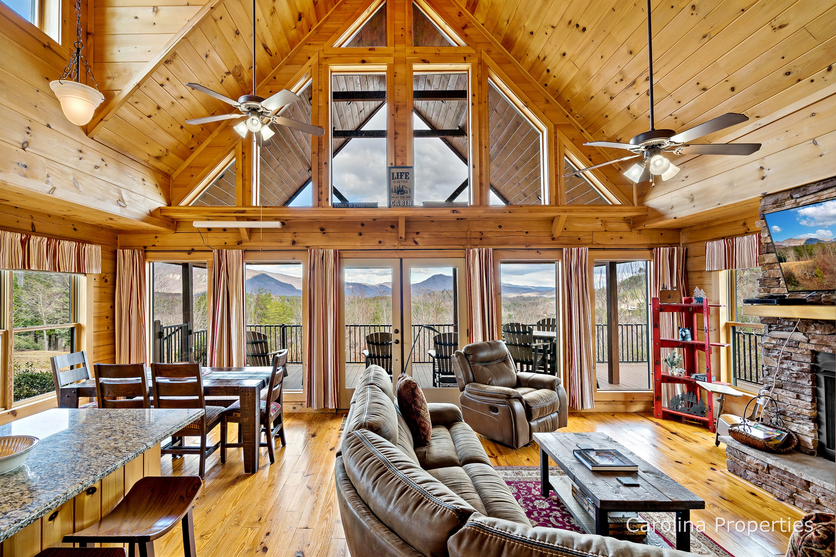 Cozy Bear Lodge features a large open concept living plan with shared space for the Kitchen, Living, and Dining Rooms