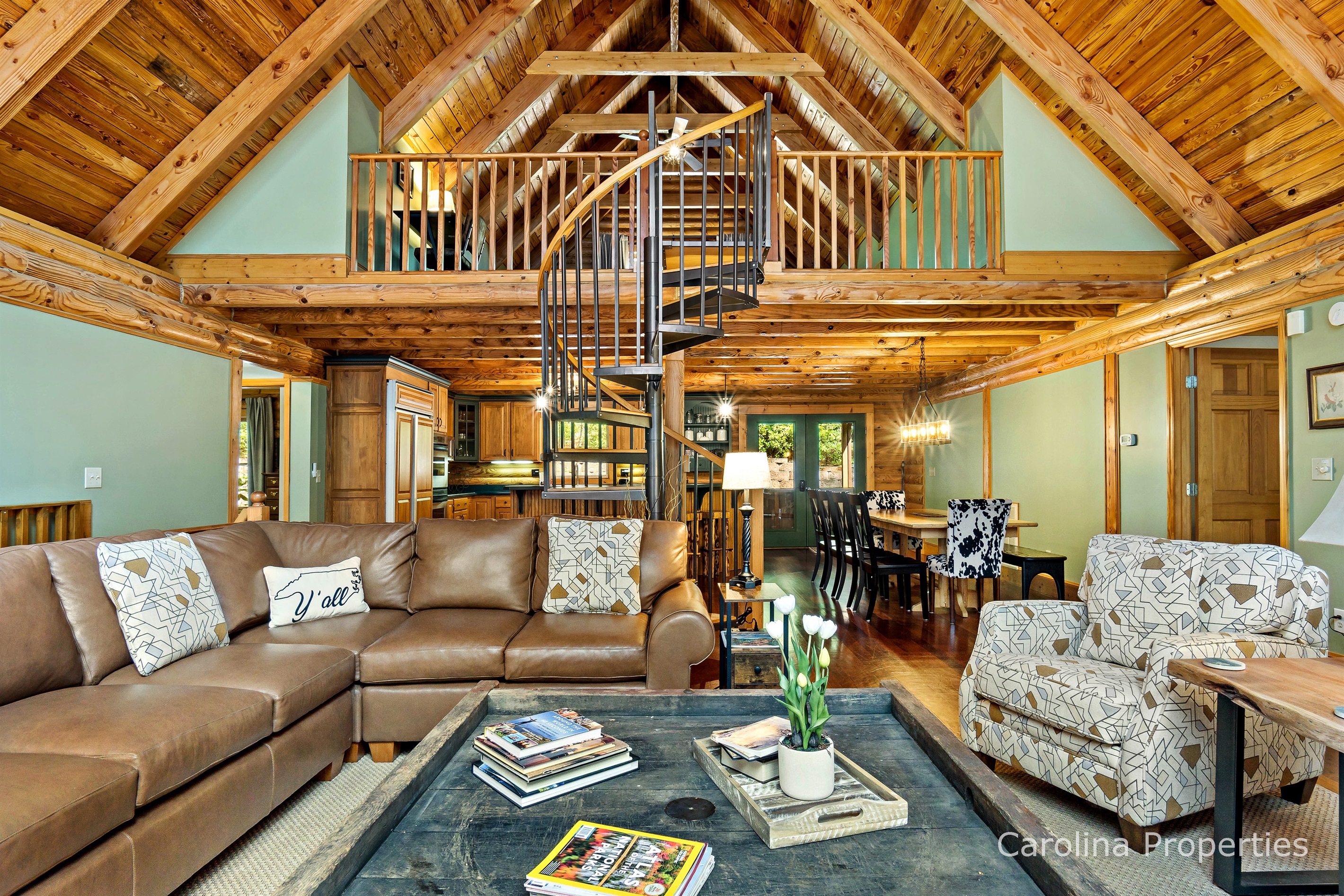 Spiral staircase leading to loft.