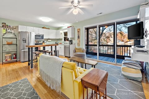 Cozy view of the living area and kitchen with views of Lake Lure