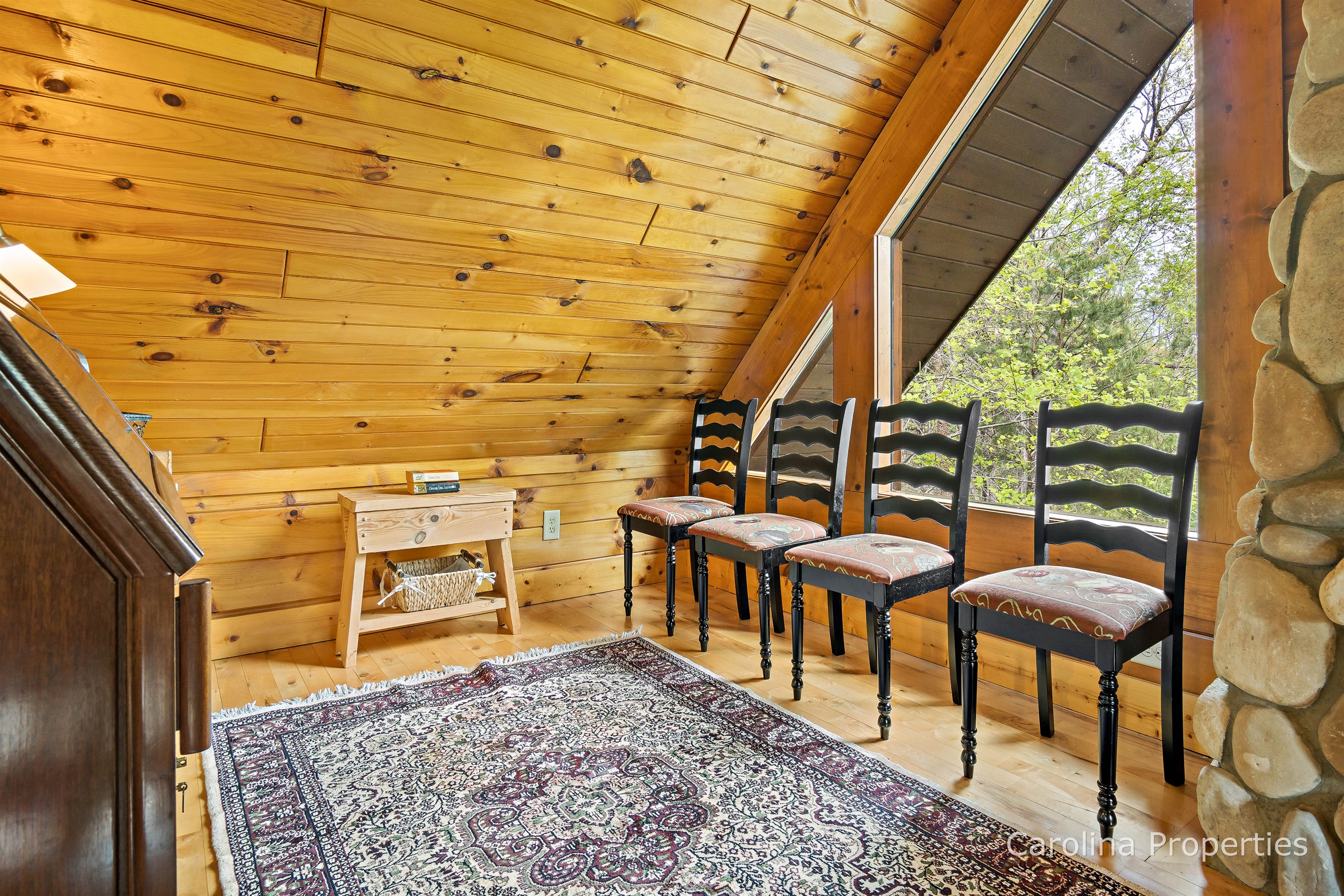 A quite place to get things done. The winding railing makes this area feel private.