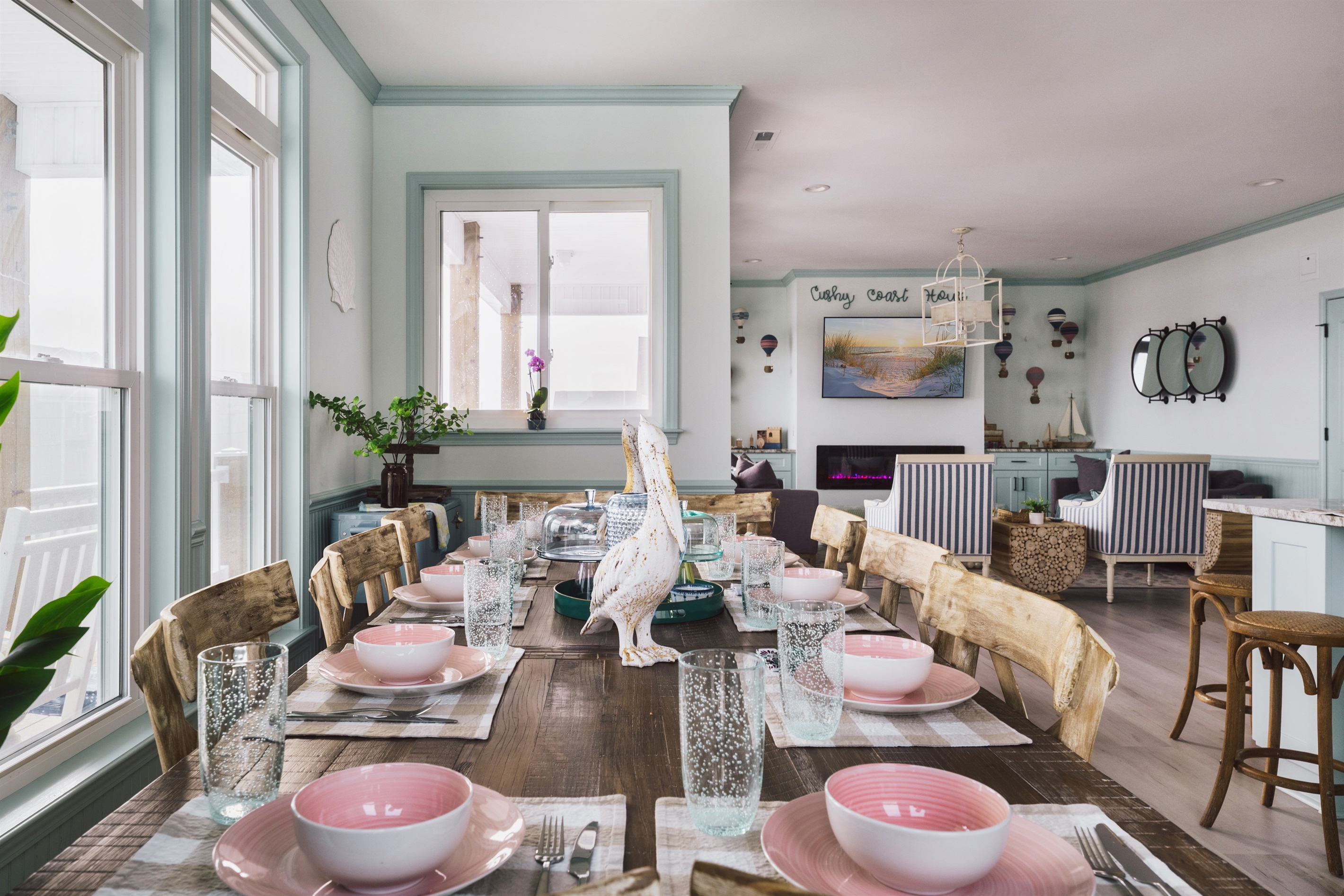 Place settings for 10 at our large dining table on the upper level so the whole family can gather round for a low country boil.