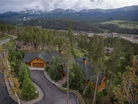 Birds eye view of the home with Breckenridge ski area visible across the valley