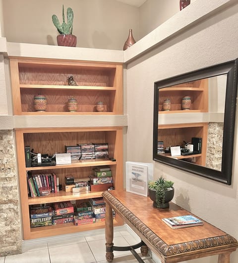 LIVING AREA – DVDs / Board Games / Welcome Book with Local Recommendations