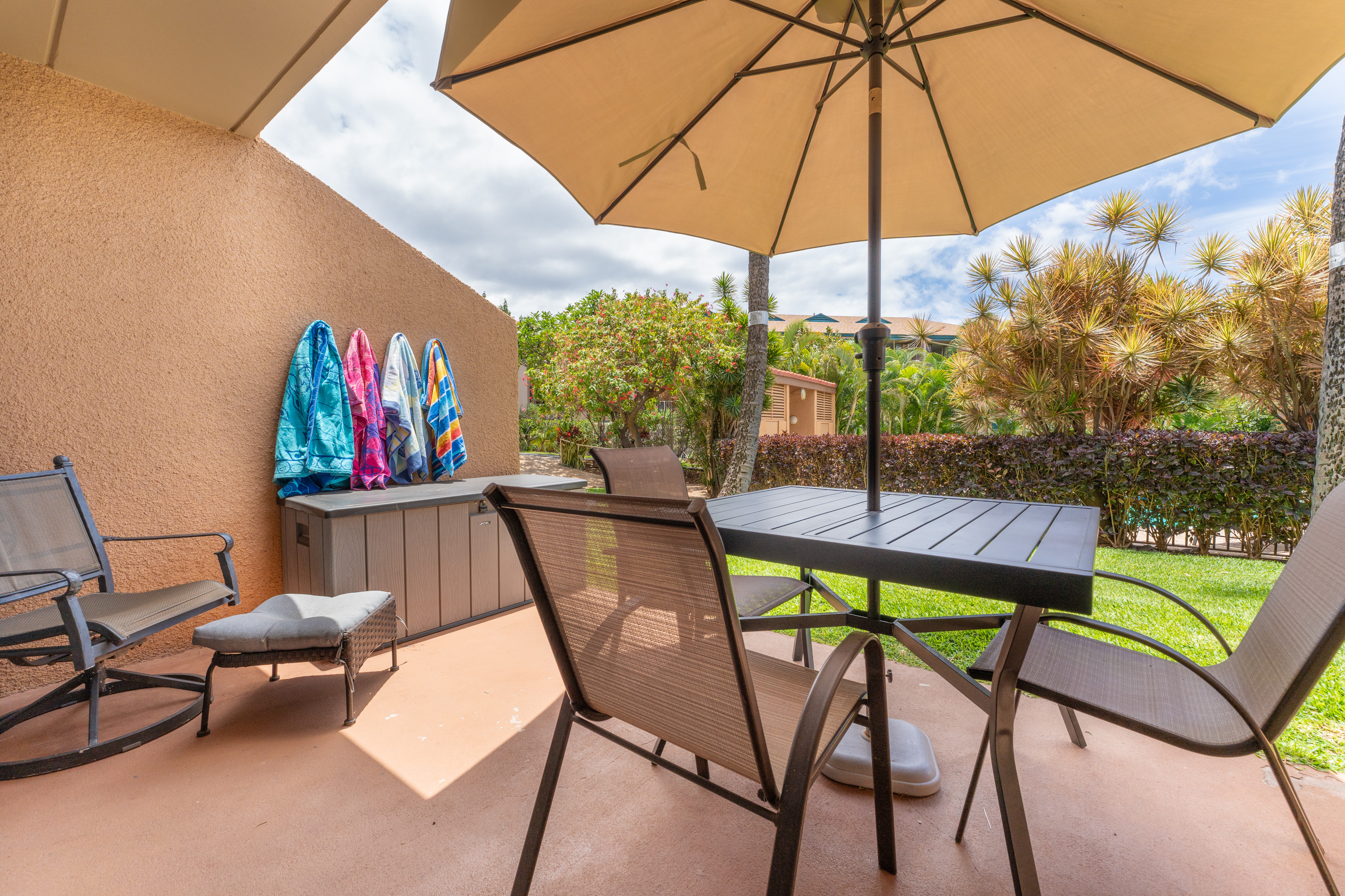 Enjoy the shade and the sun! Just off the lanai is the gated pool.
