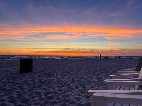 Take a walk or quick drive to Schooners 'Last Local Beach Bar', relax in their Adirondack chairs and catch the sunset