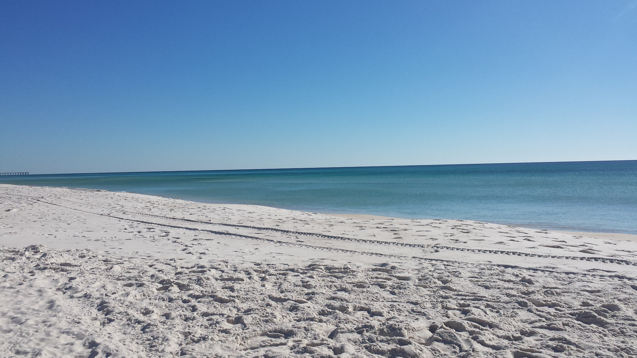 Sugar white sands and crystal clear gulf waters. 