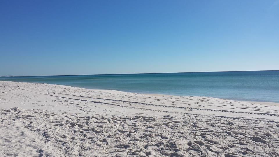 Sugar white sands and crystal clear gulf waters.