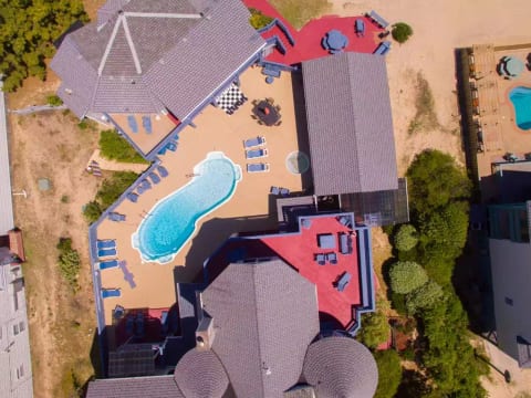 Overhead view of court yard with our 3 building around swimming pools.