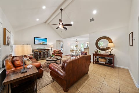 The entryway leads into a mudroom/laundry room, perfect for getting out of your grubbies and into your comfys after a long day in the Texas Brush.