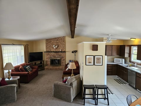 You can see how the main level is split between the Living Room and the Kitchen