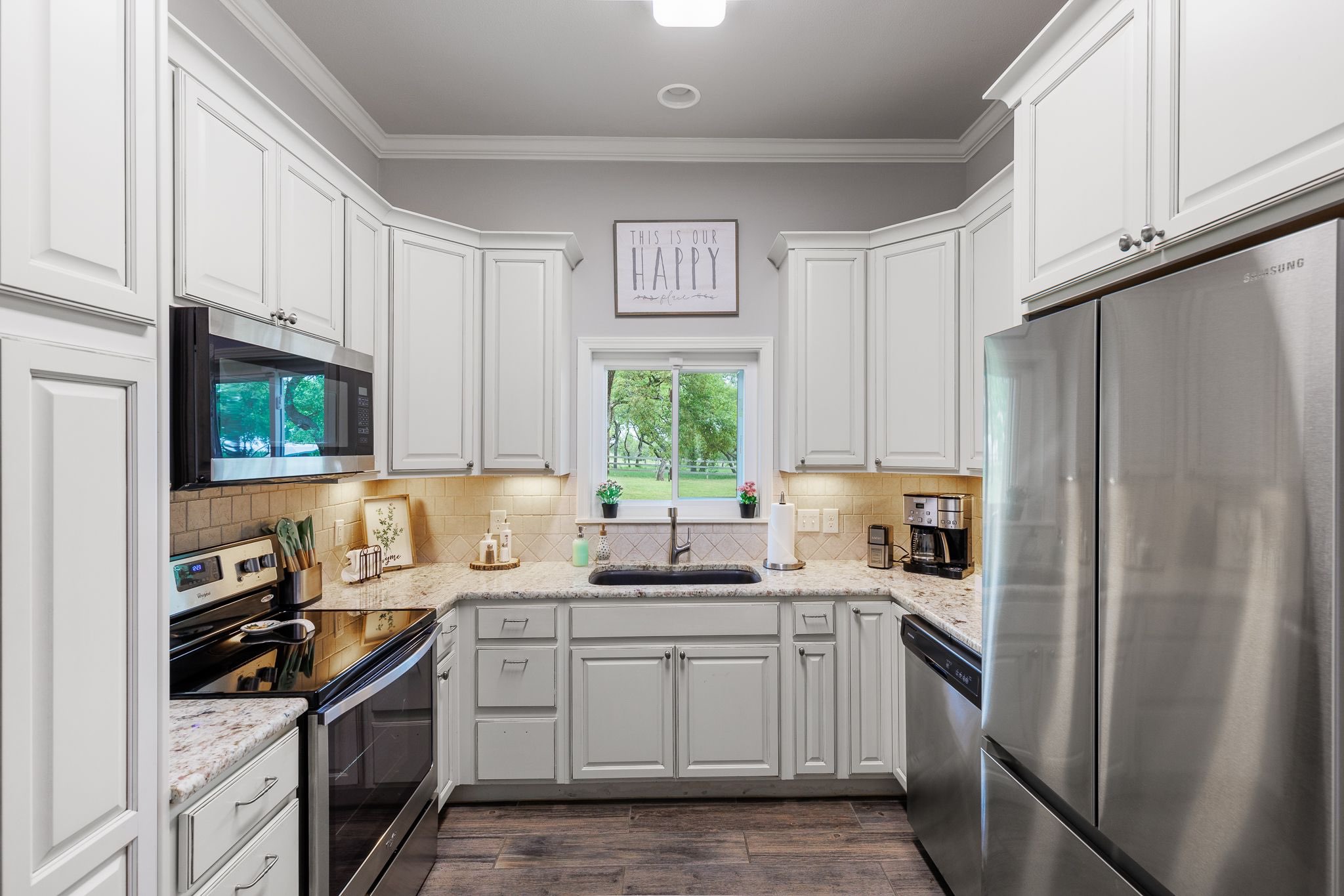 Guest house full kitchen. Refriderator, dishwasher, stove, oven and built in microwave 
