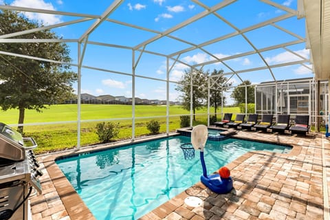 6 Lounge chairs, 6 burner BBQ grill, enclosed heated salt water pool and spa, overlooking the golf course
