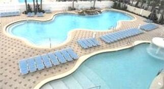 Two of six sparkling pools! - Flipflops and Chandeliers  Beachfront Studio - Panama City Beach