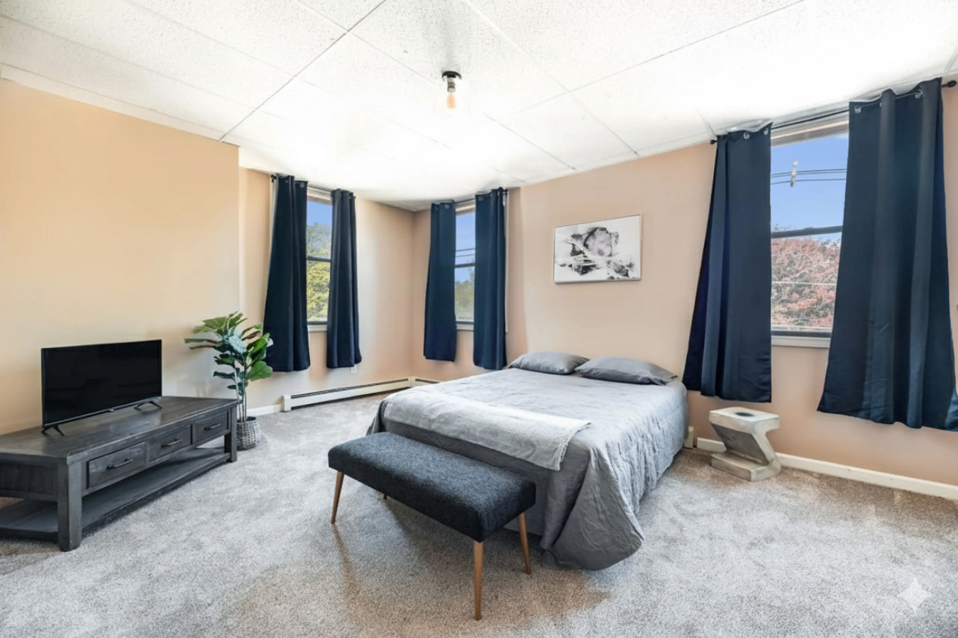 Warm & Stylish 4BR Retreat w/ Modern Workspace