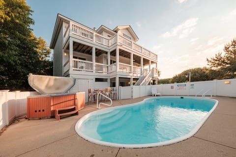 Gated private pool and hot tub. Pool deck with loungers. Southern exposure in all day sun warms pool.