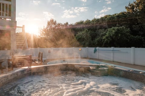 Gated private pool and hot tub. Pool deck with loungers. Southern exposure in all day sun warms pool.
