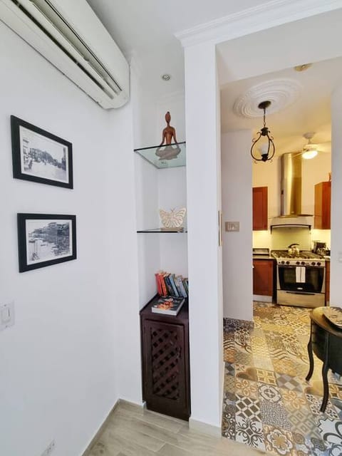 View onto the lovely niche, foyer and kitchen.